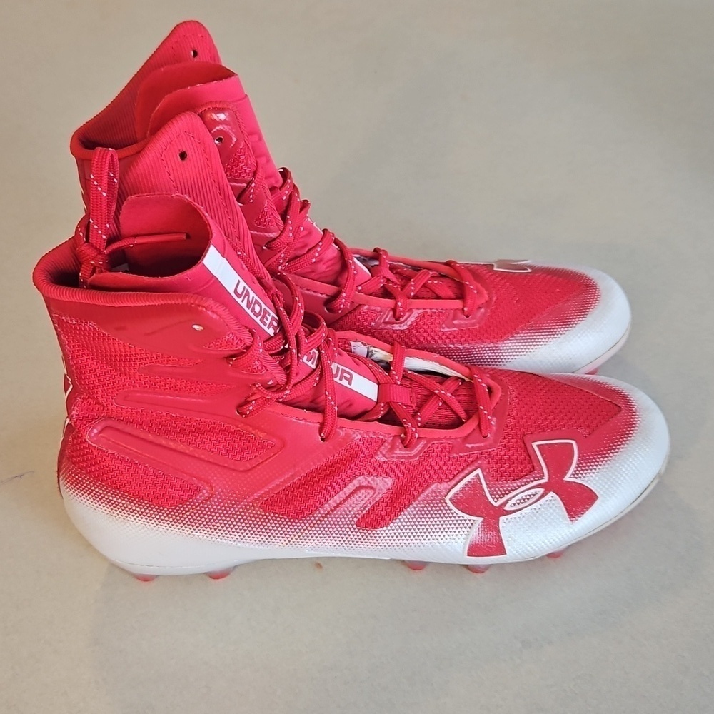 Under Armour highlight MC red football cleats